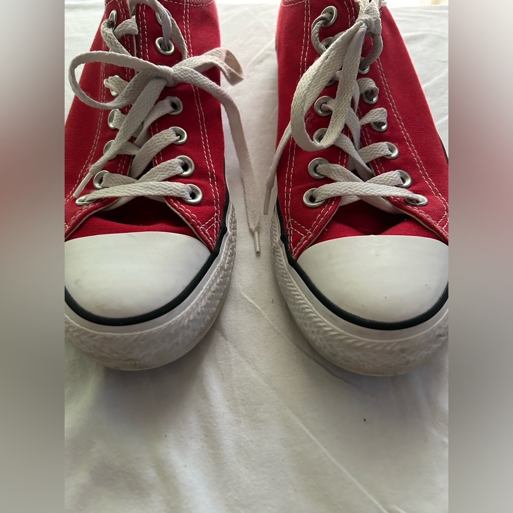 Red CT Converse, women’s size 11, men’s size 9.